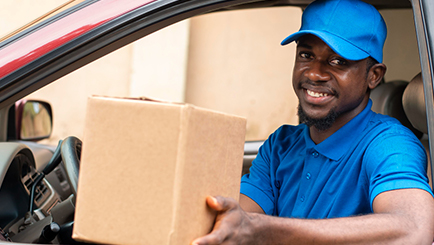 delivery man in his car